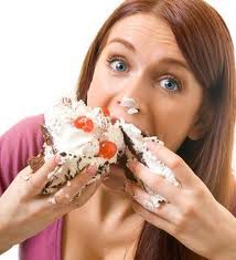 lady eating cream cake