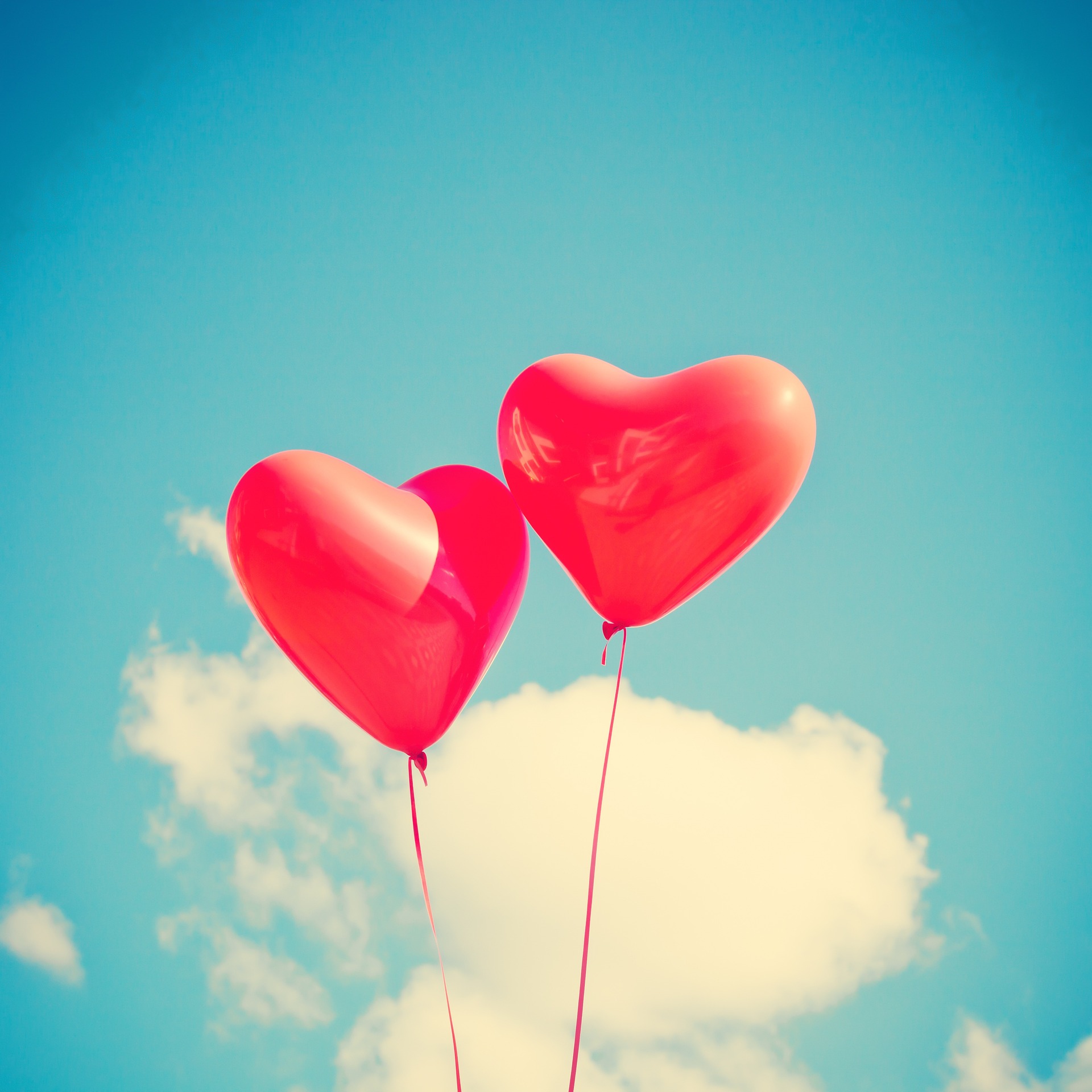 2 heart shaped balloons