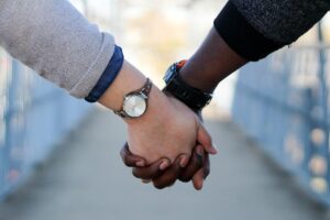 Couple holding hands